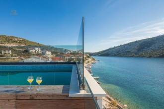 Thumbnail von Modern new-build villa in the first row to the sea with a swimming pool on the roof terrace