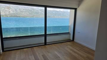 Thumbnail von Modern penthouses on the top floor with a roof terrace and pool right by the sea