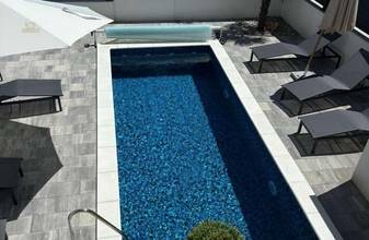 Thumbnail von Modernes Appartement + Studio mit Garten und Pool