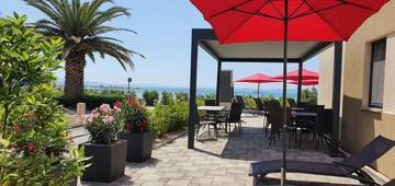 Thumbnail von House with three apartments directly on the beach