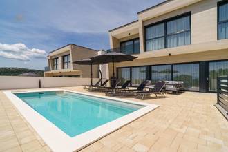 Thumbnail von Modern villa with swimming pool and sea view in a quiet location