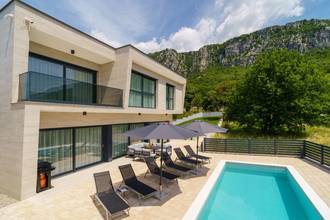 Thumbnail von Modern villa with swimming pool and sea view in a quiet location