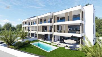 Thumbnail von Exclusive ground-floor apartment with garden and pool - 1st row to the sea
