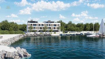 Thumbnail von Exclusive ground-floor apartment with garden and pool - 1st row to the sea