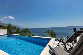 Thumbnail von Luxurious semi-detached house with swimming pool - directly on the beach