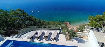 Luxuriöse Doppelhaushälfte mit Swimmingpool - direkt am Strand