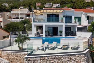 Thumbnail von Luxurious semi-detached house with swimming pool - directly on the beach