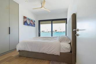 Thumbnail von Modern apartment directly on the sea - with community pool