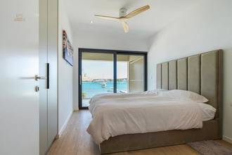 Thumbnail von Modern apartment directly on the sea - with community pool
