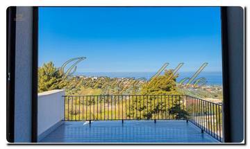 Thumbnail von Elegant, innovative, and distinctive semi-detached house with panoramic sea view, terrace, and the option to include a pool.