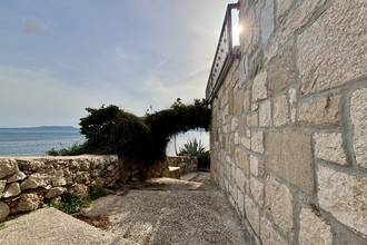 Thumbnail von Renovated stone house directly on the sea, Omis Riviera