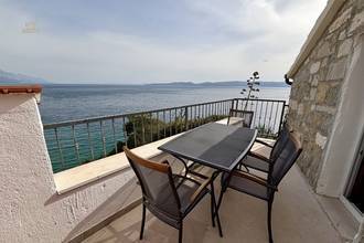 Thumbnail von Renovated stone house directly on the sea, Omis Riviera