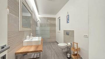 Thumbnail von Modern ground-floor apartment with sea view and parking space
