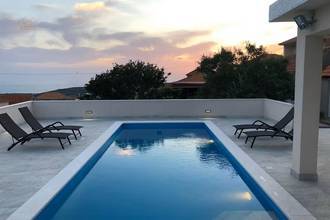 Thumbnail von Detached bungalow with swimming pool and sea view