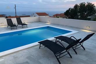 Thumbnail von Detached bungalow with swimming pool and sea view