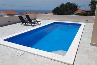 Thumbnail von Detached bungalow with swimming pool and sea view