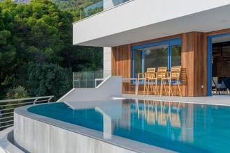 Thumbnail von Modern villa with heated pool, wellness area, and sea view