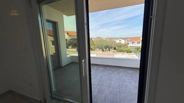 Thumbnail von Newly built apartment with roof terrace and panoramic sea view