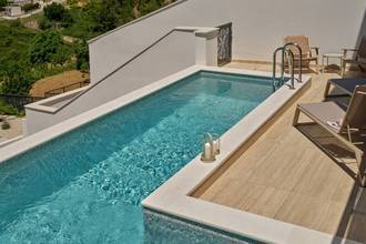 Thumbnail von Exclusive apartment on three levels in a luxury villa with a pool, sea view, and rooftop terrace