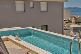Thumbnail von Exclusive apartment on three levels in a luxury villa with a pool, sea view, and rooftop terrace