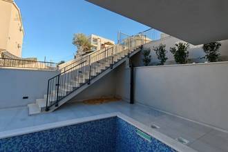 Thumbnail von Ground floor apartment with pool, garden, and sea view