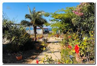 Thumbnail von Immogold Sicily Charming, renovated beach house in Altavilla Milicia near Palermo with magnificent sea views, three terraces, and a secluded garden for relaxation