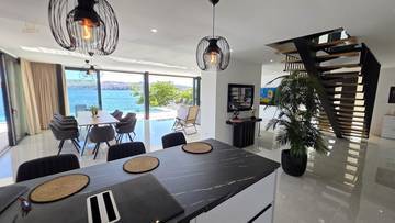 Thumbnail von Modern luxury villa directly on the sea with an infinity pool and direct beach access