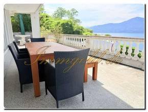 Thumbnail von Modernly renovated, exclusive, single-story detached house with a breathtaking lake view in a sunny, peaceful location.