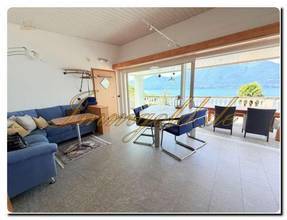 Thumbnail von Modernly renovated, exclusive, single-story detached house with a breathtaking lake view in a sunny, peaceful location.