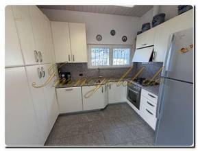 Thumbnail von Modernly renovated, exclusive, single-story detached house with a breathtaking lake view in a sunny, peaceful location.