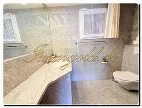 Thumbnail von Modernly renovated, exclusive, single-story detached house with a breathtaking lake view in a sunny, peaceful location.