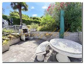 Thumbnail von Modernly renovated, exclusive, single-story detached house with a breathtaking lake view in a sunny, peaceful location.