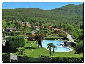 Thumbnail von Modernly renovated, exclusive, single-story detached house with a breathtaking lake view in a sunny, peaceful location.