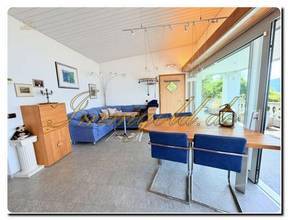 Thumbnail von Modernly renovated, exclusive, single-story detached house with a breathtaking lake view in a sunny, peaceful location.