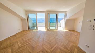 Thumbnail von Newly built apartment in the attic directly by the sea