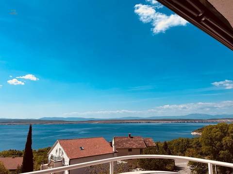 Maisonette apartment with sea view, garden, and covered parking space