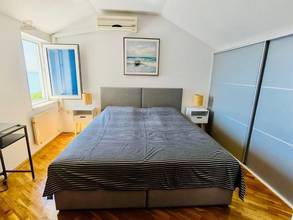 Thumbnail von Maisonette apartment with sea view, garden, and covered parking space
