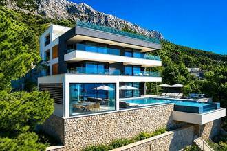 Thumbnail von Impressive luxury villa directly on the sea with an infinity pool and wellness area