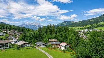 Thumbnail von Building plot with existing structures in a sunny, peaceful location