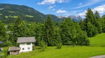 Thumbnail von Building plot with existing structures in a sunny, peaceful location