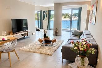 Thumbnail von Modern apartment with sea view, garage, and additional living unit just a few meters from the sea