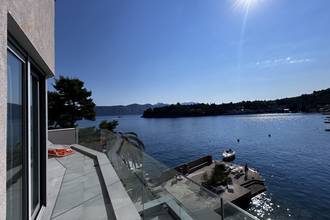 Thumbnail von Modern apartment with sea view, garage, and additional living unit just a few meters from the sea