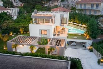 Newly built luxury villa with heated infinity pool, elevator, and sea view