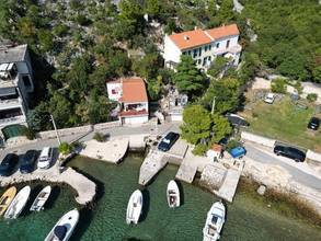 Thumbnail von Semi-detached house in the first row to the sea with boat dock (usage), garden, and garage