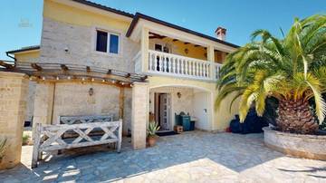 Thumbnail von Detached house with a swimming pool, sea view, and a separate konoba in the Mediterranean garden.
