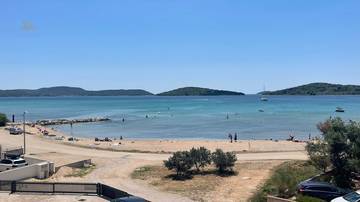 Newly built apartment with terrace and sea view, only 30 meters to the beach