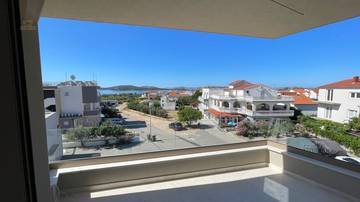 Thumbnail von Newly built apartment with sea view, covered terrace, and storage room, 650 meters to the beach