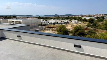 Modern maisonette apartment with roof terrace and panoramic sea view