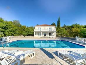 Spacious villa with swimming pool, private tennis court, and sea view