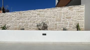 Thumbnail von Newly built semi-detached house with sea view, garden, and two parking spaces.